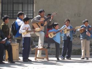 3villaserrano.kidscharango Playing the world's smallest guitar.