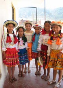 4villaserrano.emb.girls School girls dressed up for the zapateo dance.